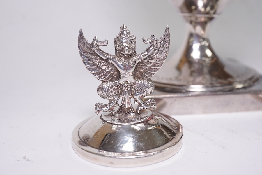 A George III silver helmet shaped cream jug by Peter & Ann Bateman, London, 1792, 14.4cm, together with two sterling menu holders. Condition - fair to good